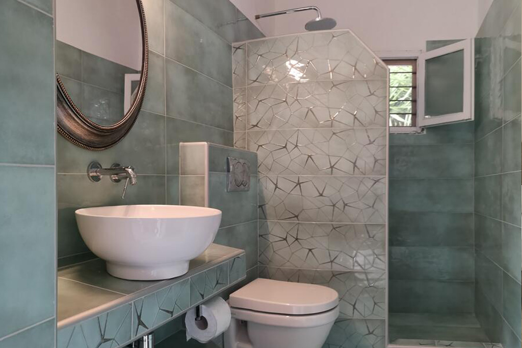 villa pine trees bedroom king size bed bathroom kardous villas skopelos greece